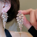 Pair of Metal Tone Leaf Crystal Drop Earrings in Pink and Green view 4