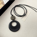 Black Ring Gray Wood Disc Cord Pendant Necklace Piece view 1