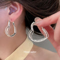 Layered Heart Outline Hoop Earrings in Silver Tone view 1