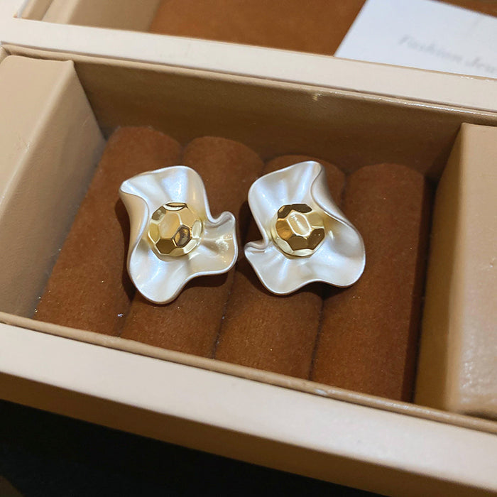 White Sculpted Flower Stud Earrings with Gold Tone Centers
