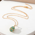 Gold Tone Ornate Egg Pendant Necklaces in Pink and Green view 4