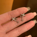 Silver Tone Four Point Star Stud Earrings With Tiny Drops view 2