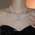 Pearl Strand Necklace with Gold-Tone Cross Pendant view 1