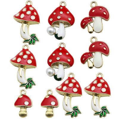 Colorful mushroom charms arranged on a light background