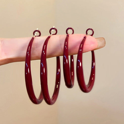Second listing image of red hoop earrings seventeen styles, showing the visible finish.
