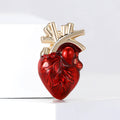 Red Translucent Anatomical Heart Brooch With Gold Tone Vessels view 1