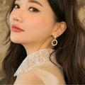 Open Triangle Pearl Look Gold Tone Dangle Stud Earrings view 4