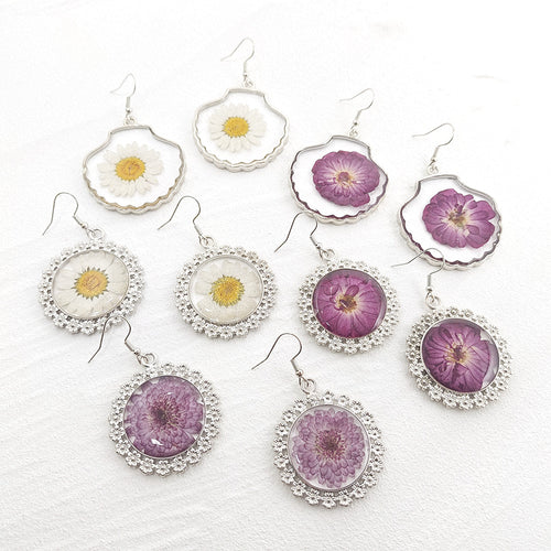 Shell and lace frame pressed flower resin earrings purple and white daisies