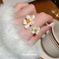 Gold Tone Open Ring With Two White Flowers And Yellow Square Crystal view 1