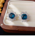 Radiant Crystal Halo Stud Earrings With Polished Metal Tone Details view 7