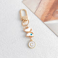 White Enamel Butterfly Evil Eye Letter Charm Gold Keychain view 7