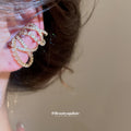 Crisscross Crystal Ear Clips in Silver and Gold Tones view 3