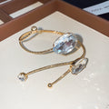 Gold Open Arm Cuffs With Large Oval Faceted Stones Trio view 3