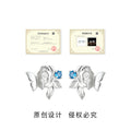 Silver Tone Sculpted Rose Butterfly And Blue Stone Stud Earrings view 3