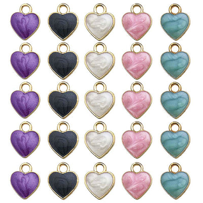 Colorful heart charms arranged on a light background