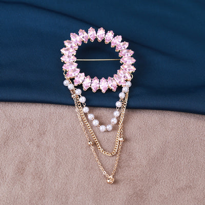 crystal circle with draped chains brooch shown from the front