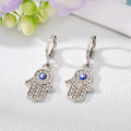 Gold and Silver Tone Pavé Crystal Hamsa Evil Eye Huggie Earrings view 9