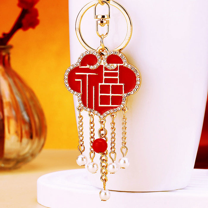 Small Red Jeweled Fortune Lock Keychain with Chain Tassel Details