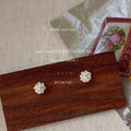 Gold Tone Mini White Pearl Cluster Flower Stud Earrings view 2
