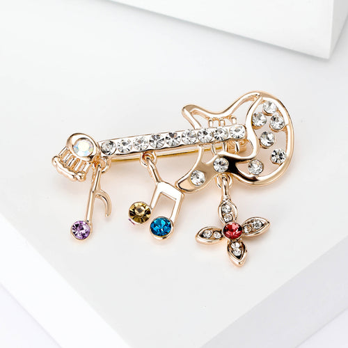 Gold Tone Guitar brooch shown in angled product view