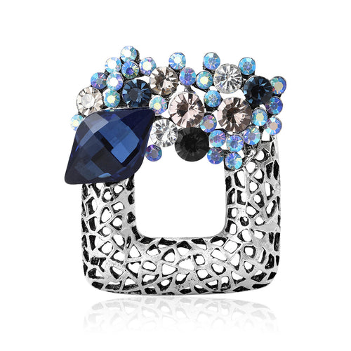 Openwork Square Crystal Brooch displayed in a styled setting
