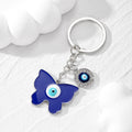 Gold and Silver Tone Blue Evil Eye Butterfly and Heart Keychains view 3