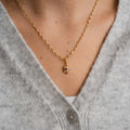 Gold Tone Ornate Geometric Pendant Necklace With Purple Stones view 4