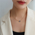 Blue Evil Eye Pendant Necklace Gold Spiked Frame Chain view 3