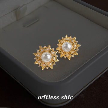 Gold Tone Clear Stone Sunburst And White Pearl Center Stud Earrings