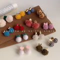 Fluffy Pom-Pom Stud Earrings Seven Winter Style Collection view 1