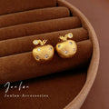 Rounded Apple Stud Earrings in Gold and Silver Tones view 2