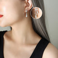Asymmetric Liquid Drop Stud Earrings Gold And Steel Pair view 6