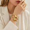 Gold Steel Puffy Heart CZ Twisted Open Cuff Bangle view 2