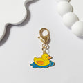 Gold Tone Yellow Duck Heart-Clasp Charms in Twelve Playful Designs view 7