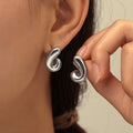 Twisted Spiral Curl Stud Earrings in Gold and Steel view 3