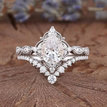 Pear-Shaped Clear Solitaire Halo Two-Ring Set In Silver Tone