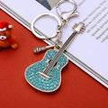 Jeweled Guitar Keychains in Red and Blue Pictured Colors view 2