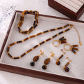 Tiger Eye Tube Bead Necklace And Gold Accent Earrings Set view 2