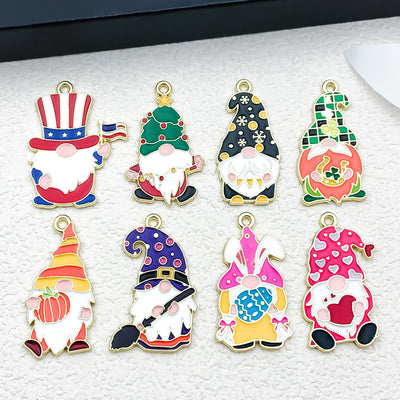 Colorful cake charms arranged on a light background