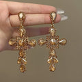 Crystal Cross Drop Stud Earrings in Silver or Champagne Gold Tone view 1