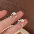 Gold Tone Clear Stone Wreath And Pale Blue Flower Stud Earrings view 2