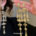 Silver Tone Oval Medallion Fringe Drop Earrings Decorative Jewelry Pair view 1