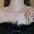 Gold Tone Wheat Leaf Crystal Necklace And Long Earring Set view 2