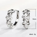 Silver Floral Huggie Hoop Earrings Clear CZ Centers view 4