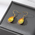 Gold Tone Faceted Iridescent Teardrop Crystal Hook Earrings in Nine Colors view 4