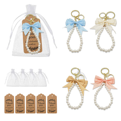 An organza bag and thank-you tag are displayed beside blue, ivory, tan and peach bow keychains.