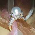 Pearl-Like Round Cabochon Crisscross Ring In Gold Tone view 1
