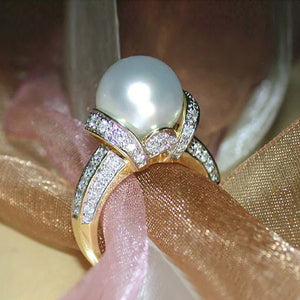 Pearl-Like Round Cabochon Crisscross Ring In Gold Tone