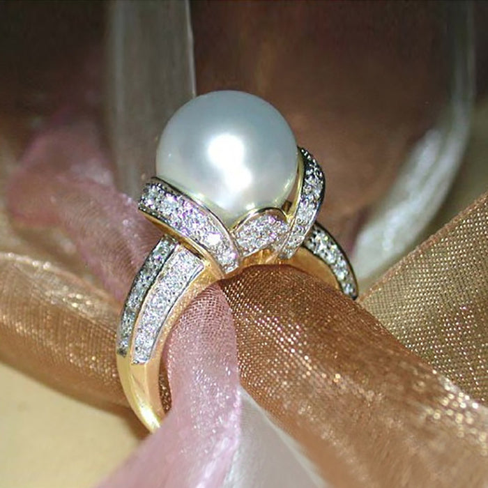 Pearl-Like Round Cabochon Crisscross Ring In Gold Tone