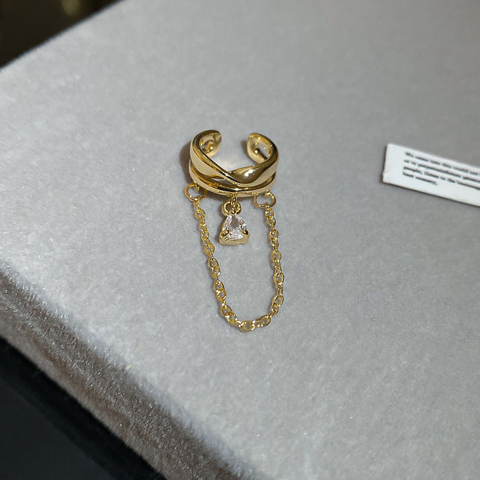 Gold Tone Double Ring Ear Cuff With A Fine Chain Drape